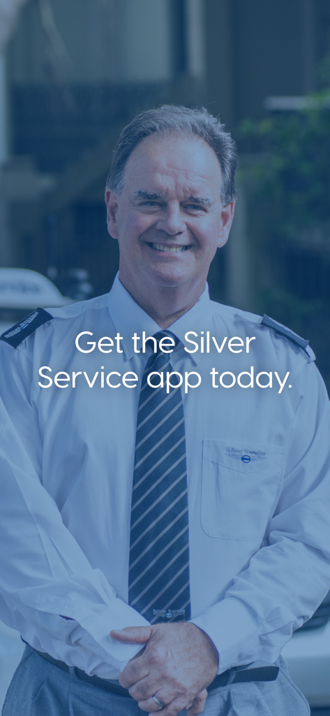 Smiling professional chauffeur in uniform with text inviting to download the Silver Service app