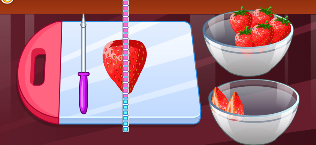 Cooking strawberry short cake - A virtual knife slicing a strawberry on a cutting board in a kids cooking game