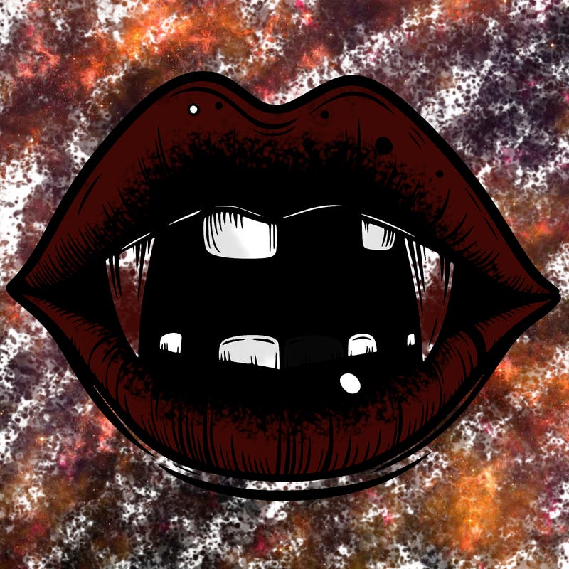 lips with vampire teeth