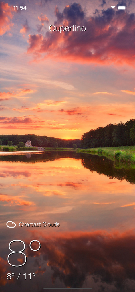 Local Meteo - weather live - Local Meteo weather app interface showing temperature and overcast clouds over a scenic sunset background