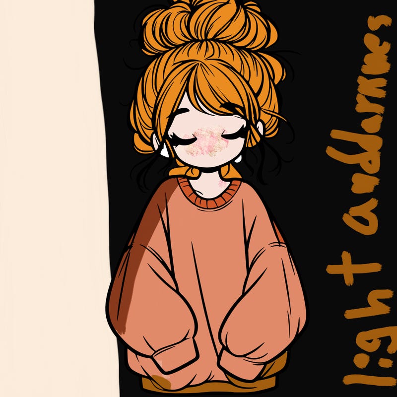 girl with baggy sweatshirt and messy bun