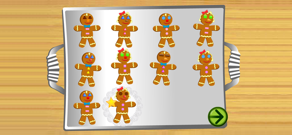 A tray of gingerbread cookies decorated with colorful geometric shapes for learning