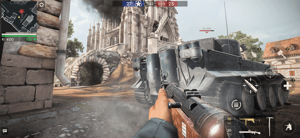 First person shooter gameplay in World War Heroes showing a player holding a rifle next to a tank
