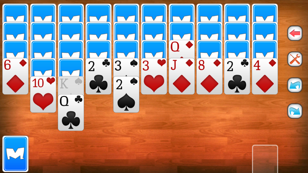Spider Solitaire game interface with cards on a wooden background