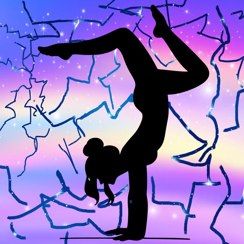 a woman doing a handstand