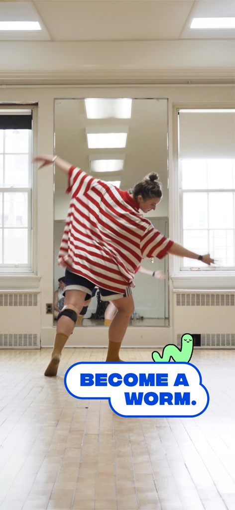 WORM.dance - A person in a striped shirt dancing in a studio with a Become a Worm graphic overlay