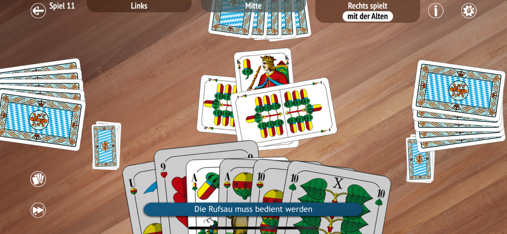 Schafkopf - Partida del juego de cartas Schafkopf mostrando cartas bávaras tradicionales en una mesa de madera digital.