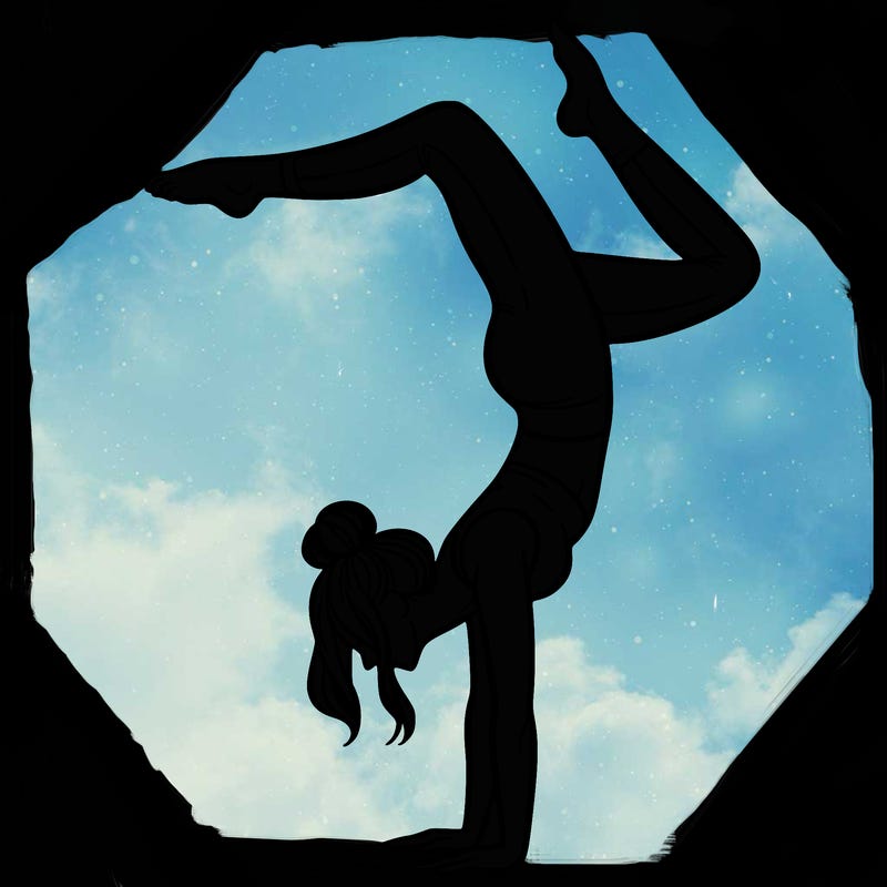 a woman doing a handstand