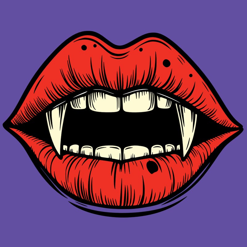 lips with vampire teeth