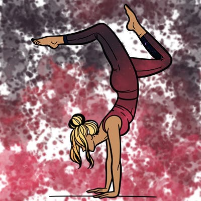 a woman doing a handstand