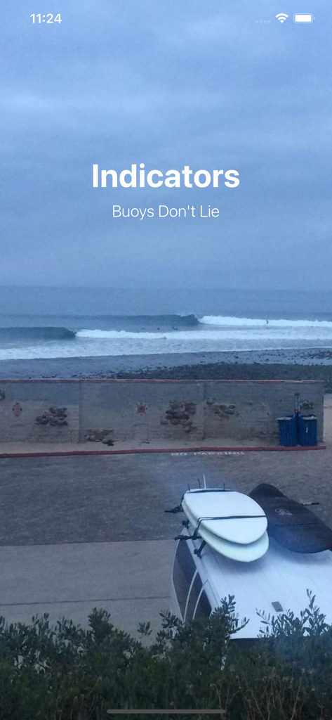 Surf Report and Forecast Tool - Indicators surf forecast app welcome screen with coastal wave view and slogan Buoys Dont Lie