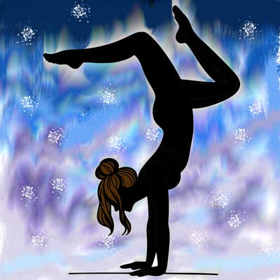 a woman doing a handstand