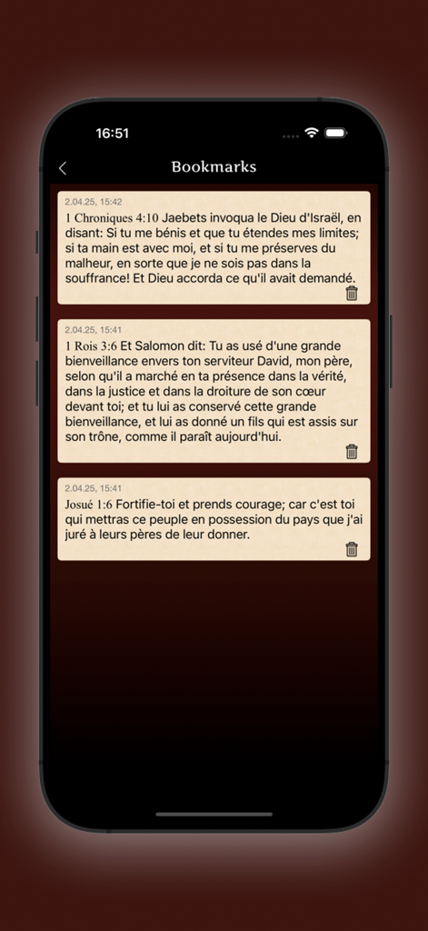 Bookmarks screen of the La Sainte Bible app showing saved French scripture verses on a parchment background.