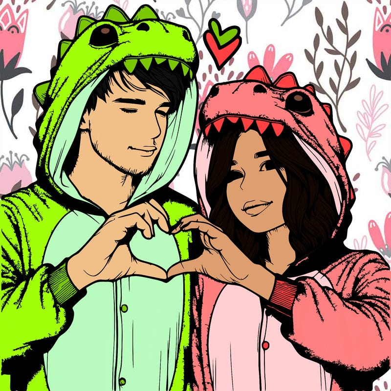 realistic couple wearing matching dinosaur onesies with heart hand gesture