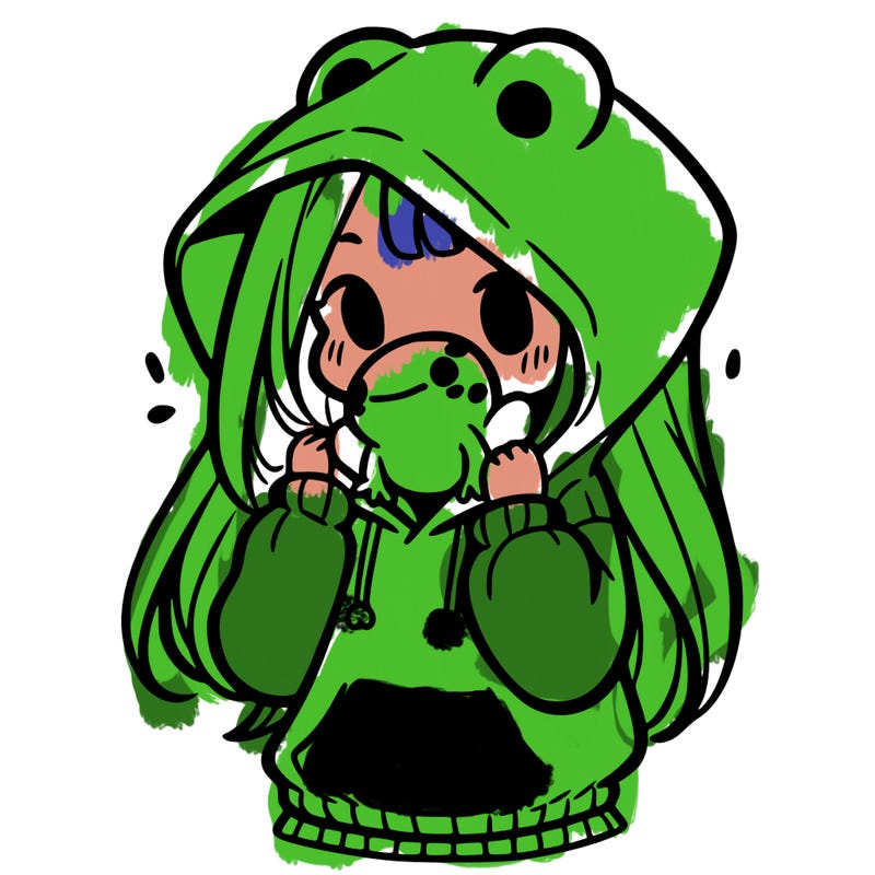 a girl holding a froggy hoodie