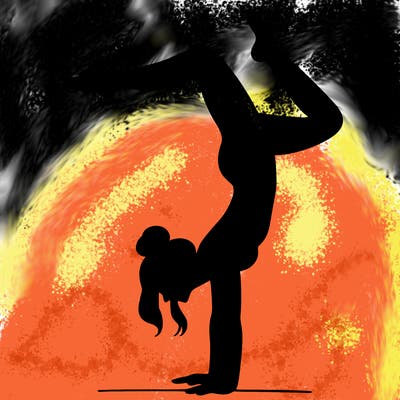 a woman doing a handstand