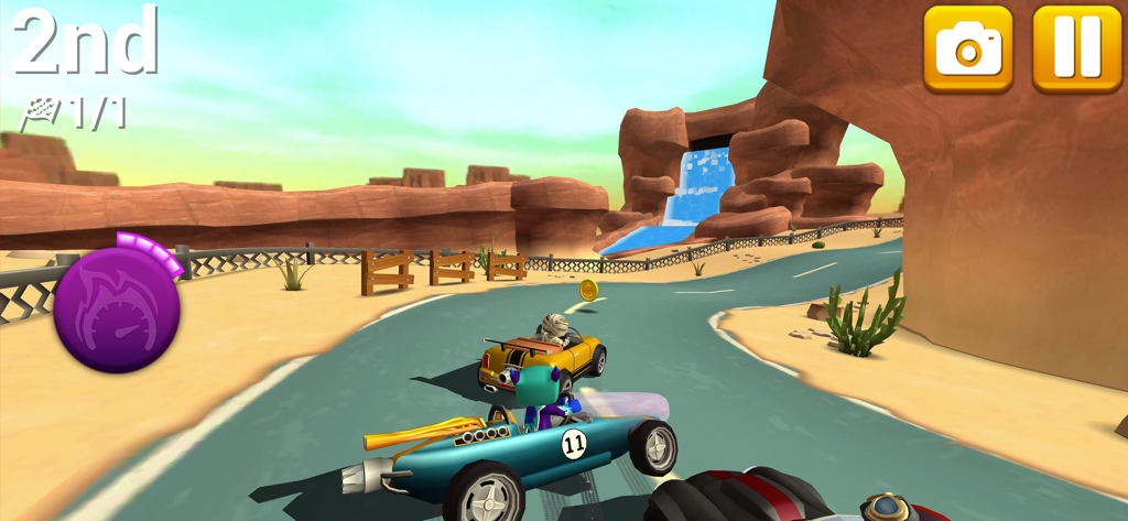 Rev Heads Rallyのゲームプレイ画面。青いレーシングカーが滝を背景にした砂漠の峡谷トラックを走っている。