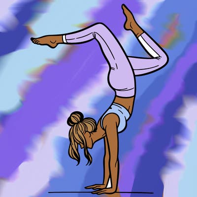 a woman doing a handstand