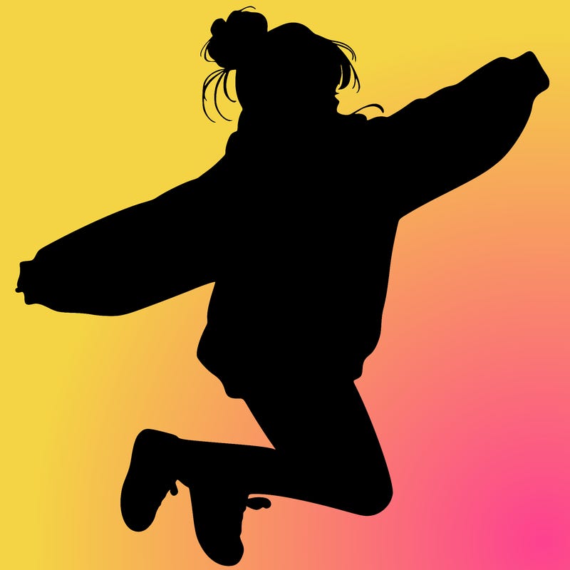 realistic girl jumping with a bun and oversized sweatshirt
