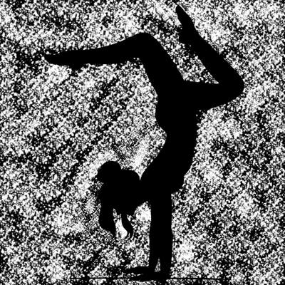 a woman doing a handstand