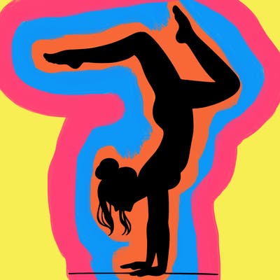 a woman doing a handstand