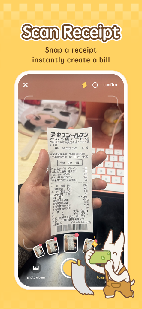 MoneyUP - Money Tracker App - A hand holding a store receipt being scanned by the MoneyUP app camera with Tomi the dog mascot.