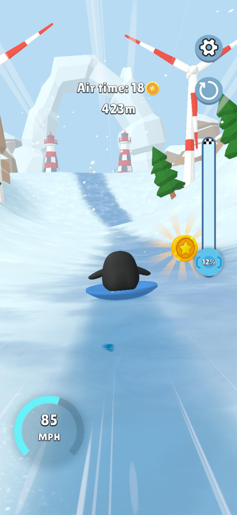 Un pingüino deslizándose por una ladera nevada en el juego móvil Sled Surfers.