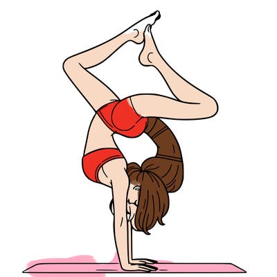 a woman doing a handstand