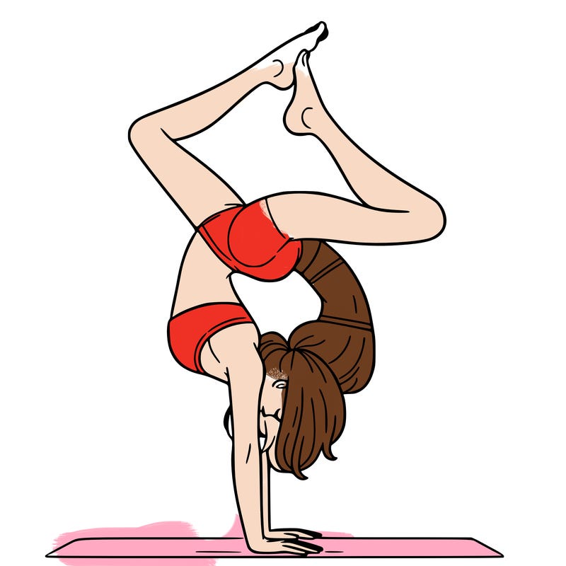 a woman doing a handstand