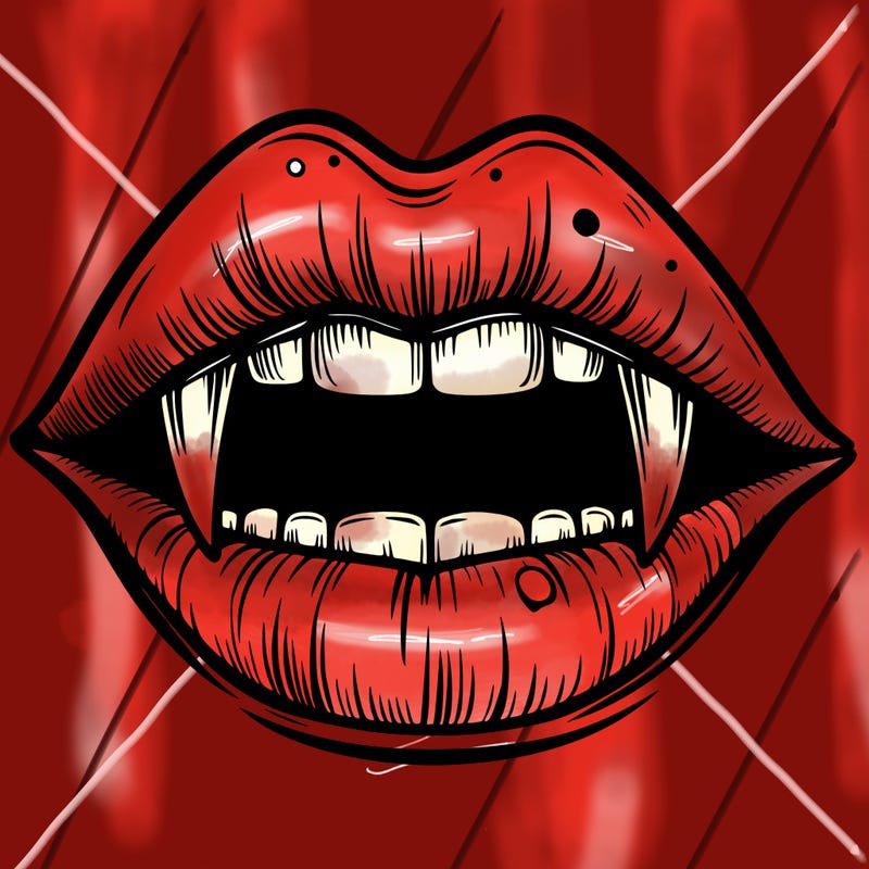 lips with vampire teeth