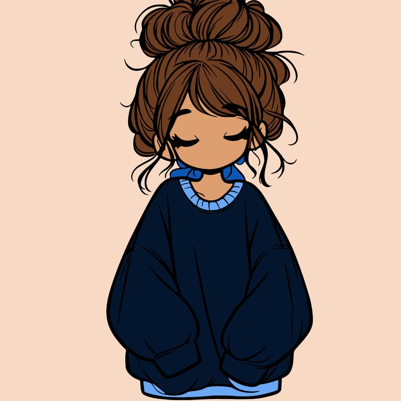 girl with baggy sweatshirt and messy bun