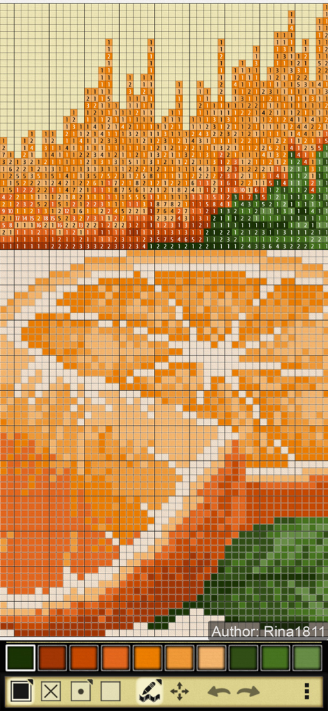 A solved colored nonogram puzzle revealing an image of an orange slice and green leaves