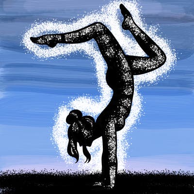 a woman doing a handstand