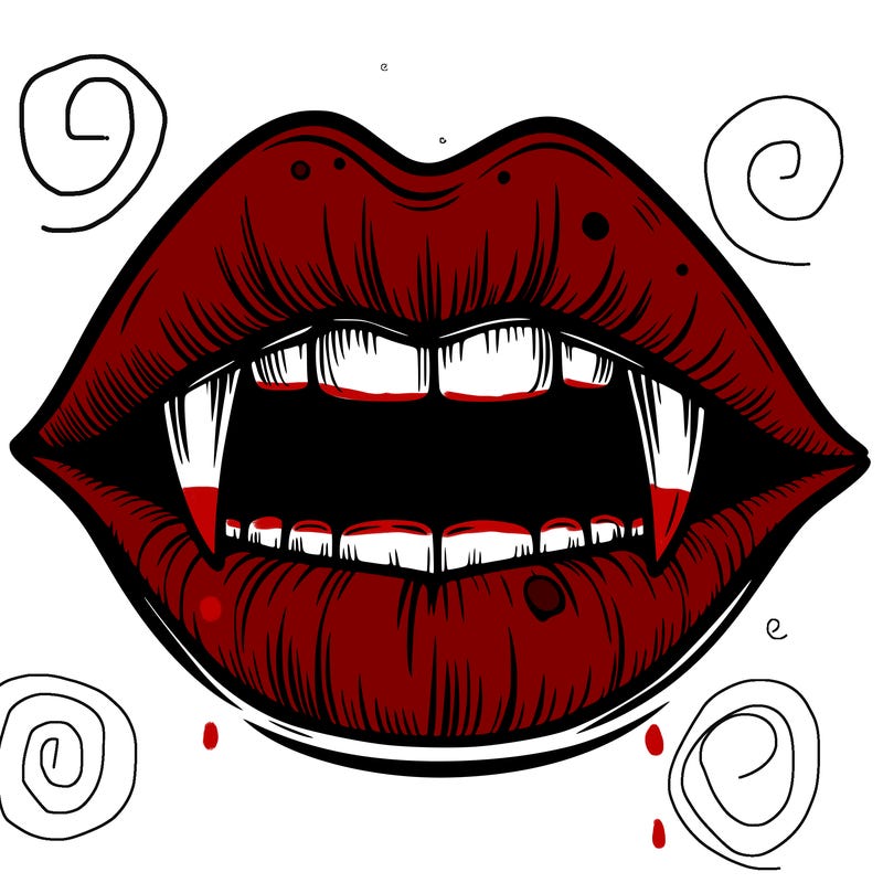 lips with vampire teeth