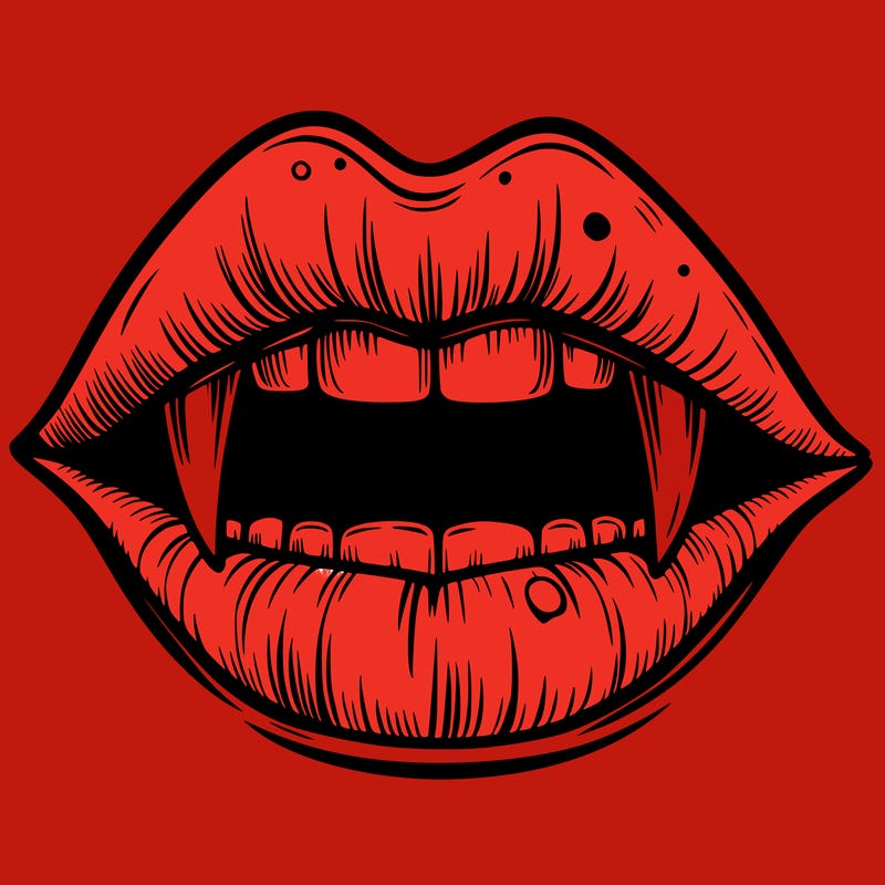 lips with vampire teeth