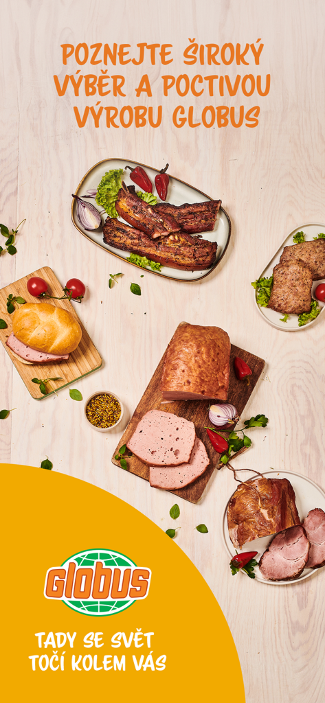 A variety of high quality meats and cold cuts from the Globus butcher department displayed on wooden boards