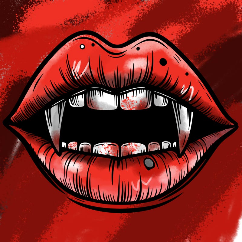 lips with vampire teeth