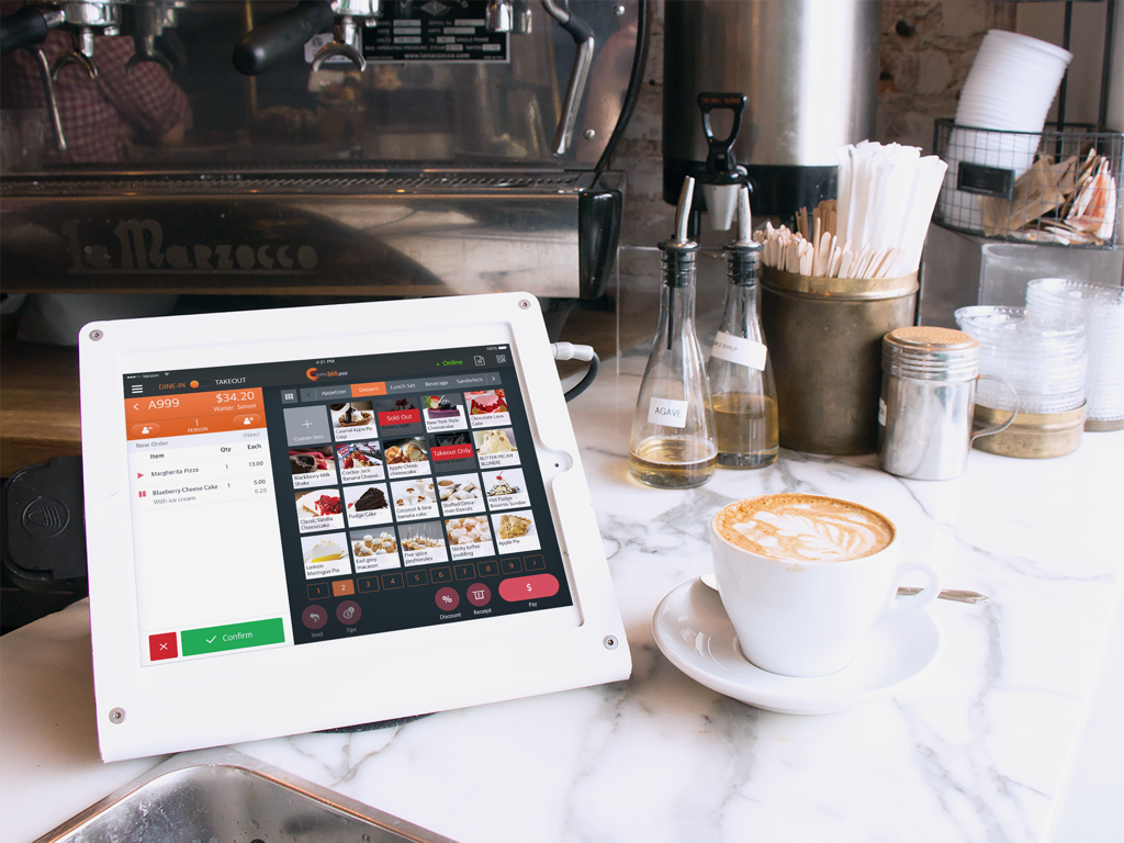 Eats365 POS application running on an iPad at a restaurant checkout counter next to a latte