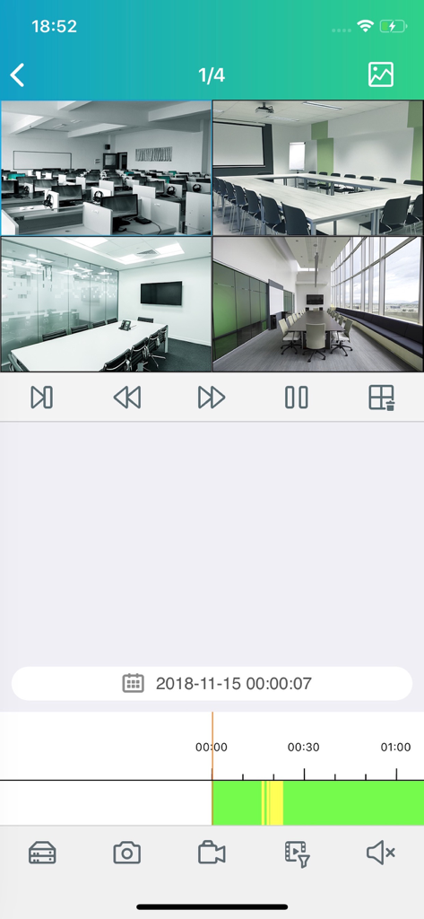RXCamView mobile app interface showing remote video playback of four security camera feeds from an office environment.
