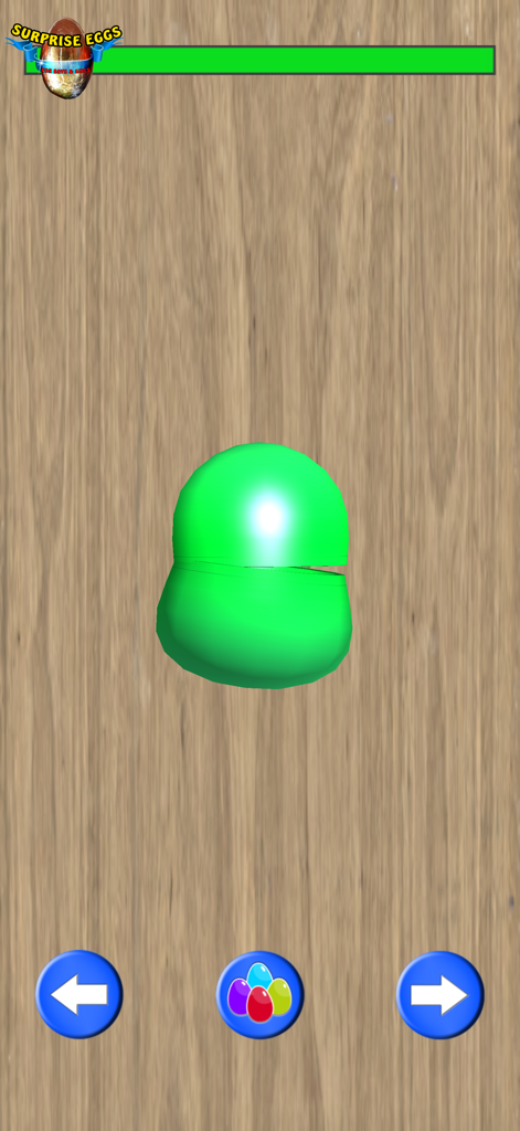 Surprise Eggs for Boys & Girls - Uma cápsula de ovo surpresa de plástico verde em um fundo de madeira.