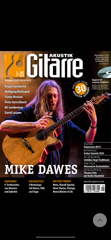 AKUSTIK GITARRE - Digitales Magazin-Cover von AKUSTIK GITARRE mit dem Gitarristen Mike Dawes beim Spielen einer Akustikgitarre.