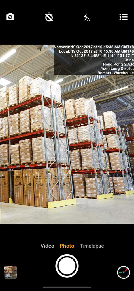 Warehouse interior photo with a professional GPS and network synchronized timestamp overlay.