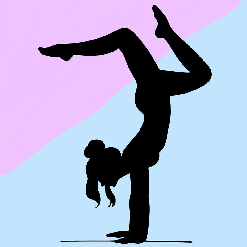 a woman doing a handstand