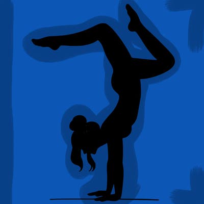 a woman doing a handstand