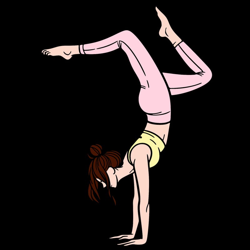 a woman doing a handstand