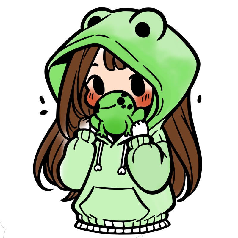 a girl holding a froggy hoodie