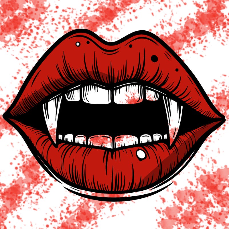 lips with vampire teeth
