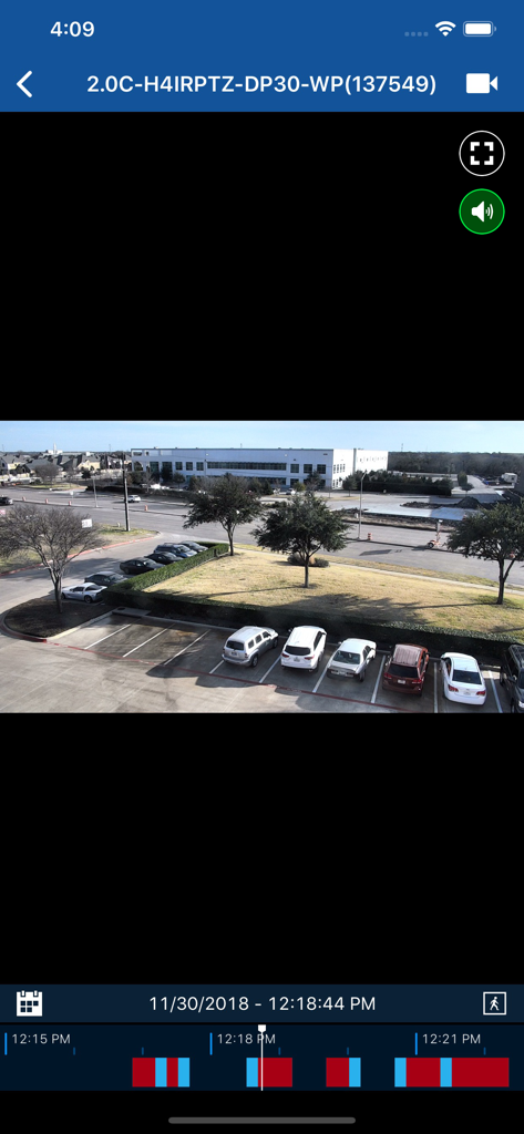 ACC Mobile 3 - ACC Mobile 3 app interface displaying recorded security camera footage of an office parking lot with a playback timeline