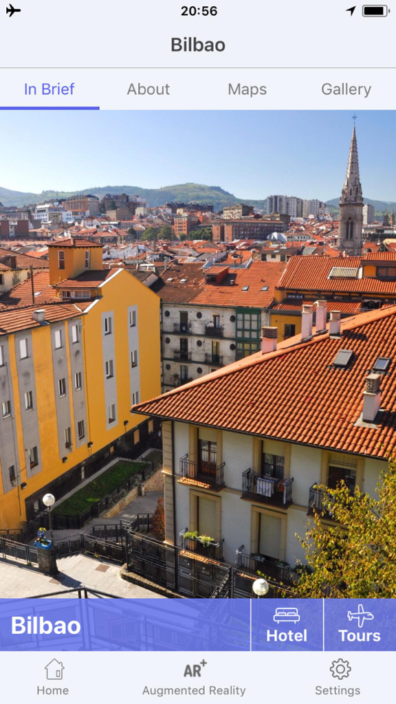 Bilbao Travel Guide Offline - Interfaz de la aplicación Guía de Viaje de Bilbao Offline que muestra una vista de la ciudad y pestañas de navegación