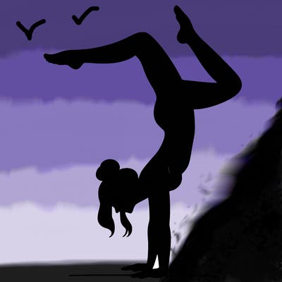 a woman doing a handstand